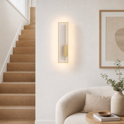 Brushed gold Arc wall lamp, right version, beside a staircase