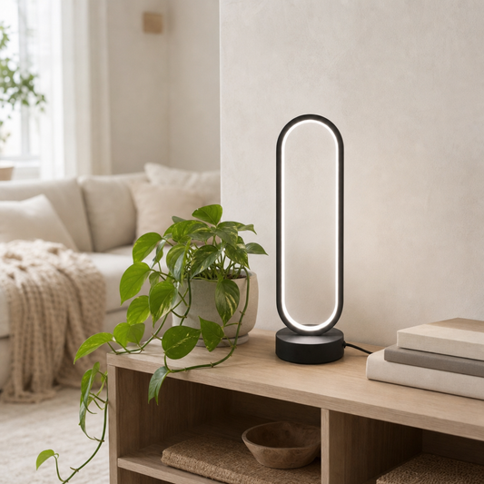 Halo Ring Lamp in natural white on a living room bookshelf