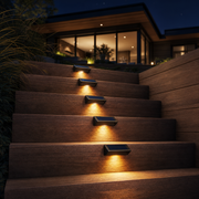 Solar step lights lighting outdoor deck stairs at night